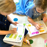 Children completing the Grow Journal