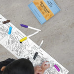 Child colouring the Hey Doodle silicone book Old MacDonald