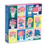 Galison 500 piece puzzle called Ever Upward with flower vases and inspirational quotes.