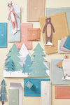 Some of the contents of the Meri meri Woodland Paper Play advent calendar