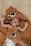 Baby with Mister Fly bath mitt and hooded towel in cheetah design