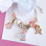 All i Want for Christmas pink children's charm bracelet by Lauren Hinkley