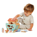 Toddler playing with Tender leaf Toys Little Noah's Ark