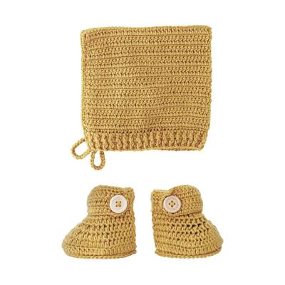 Hand crocheted bonnet and booties set in turmeric colour.