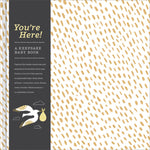 "You're Here" baby milestone book